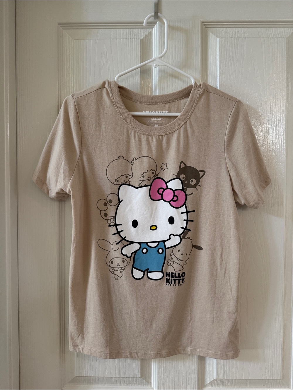 Hello Kitty Beige Graphic T-shirt Tee with Pink Bow and Blue Outfit